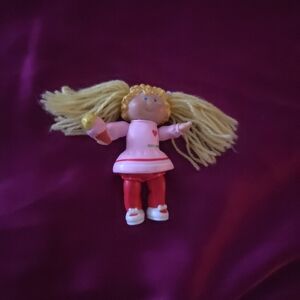 Adorable Pink Doll with Blonde Hair